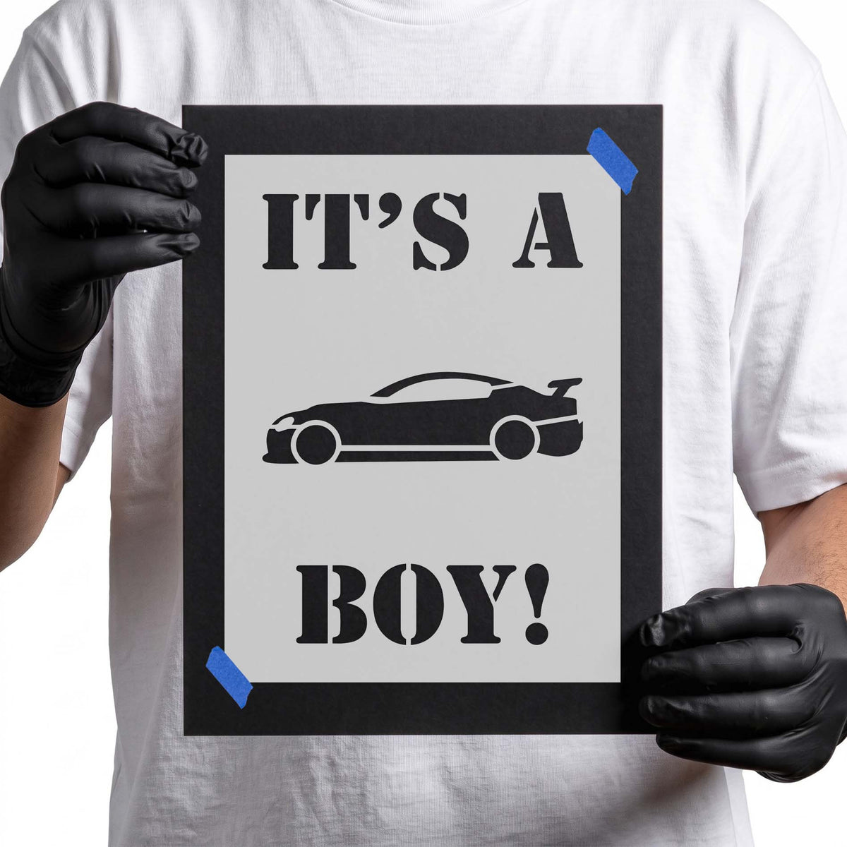It's a Boy stencil with bold serif lettering and a side-view sports car silhouette