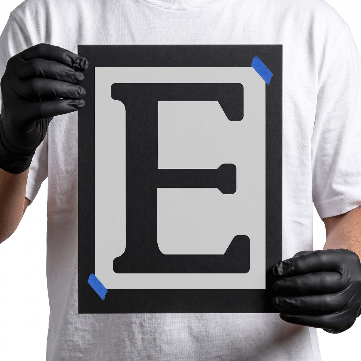 Letter E stencil featuring a bold uppercase block letter design