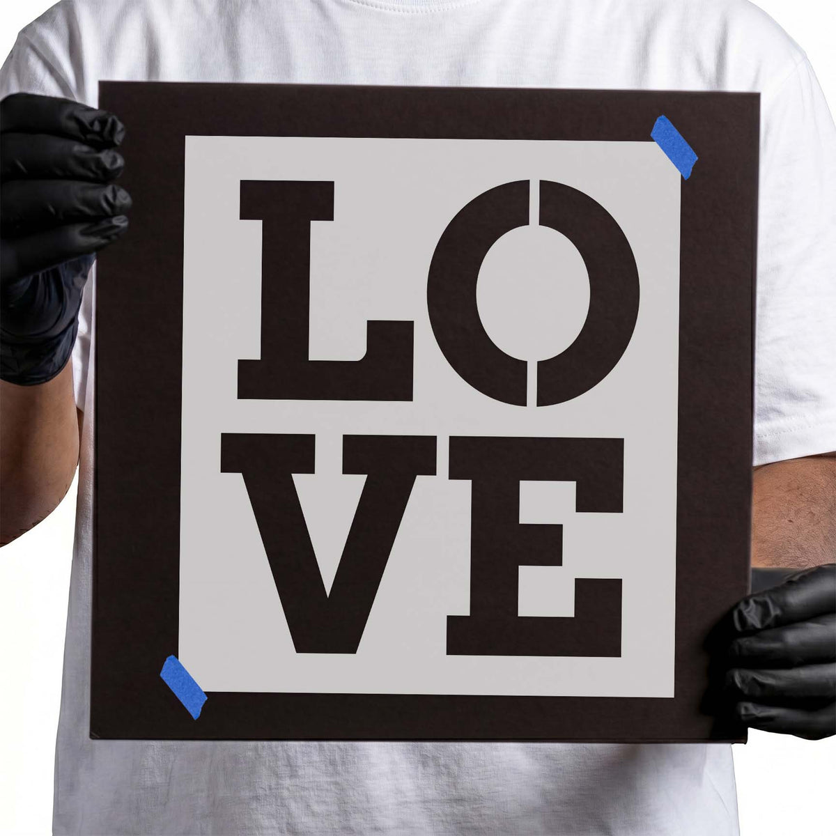 Love stencil with bold block letters arranged in a square layout