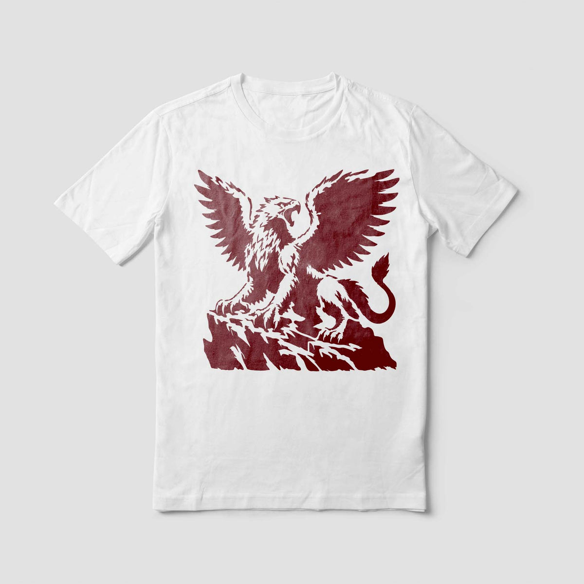 A white shirt features the Majestic Griffin on Cliff Stencil with a dramatic winged griffin on rocky terrain.