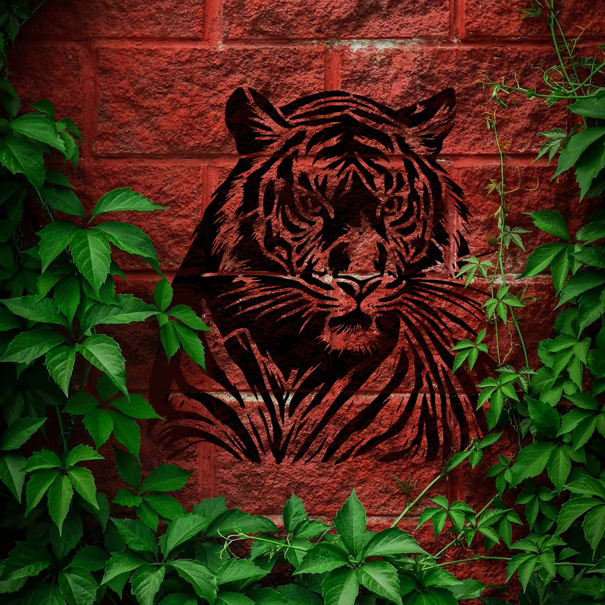 Majestic Tiger Portrait stencil painted black on a red brick wall