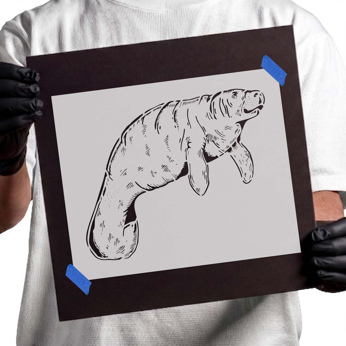 Detailed manatee stencil with broad tail, rounded body, and paddle-like flippers