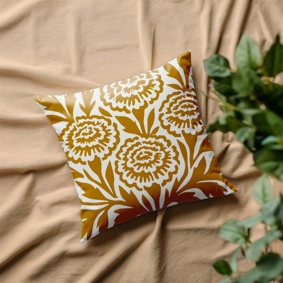 Decorative pillow featuring the Marigold Flower Stencil in warm golden tones.