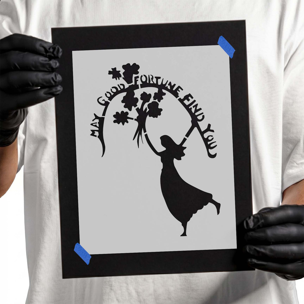 Good fortune quote stencil with graceful figure and floral bouquet silhouette