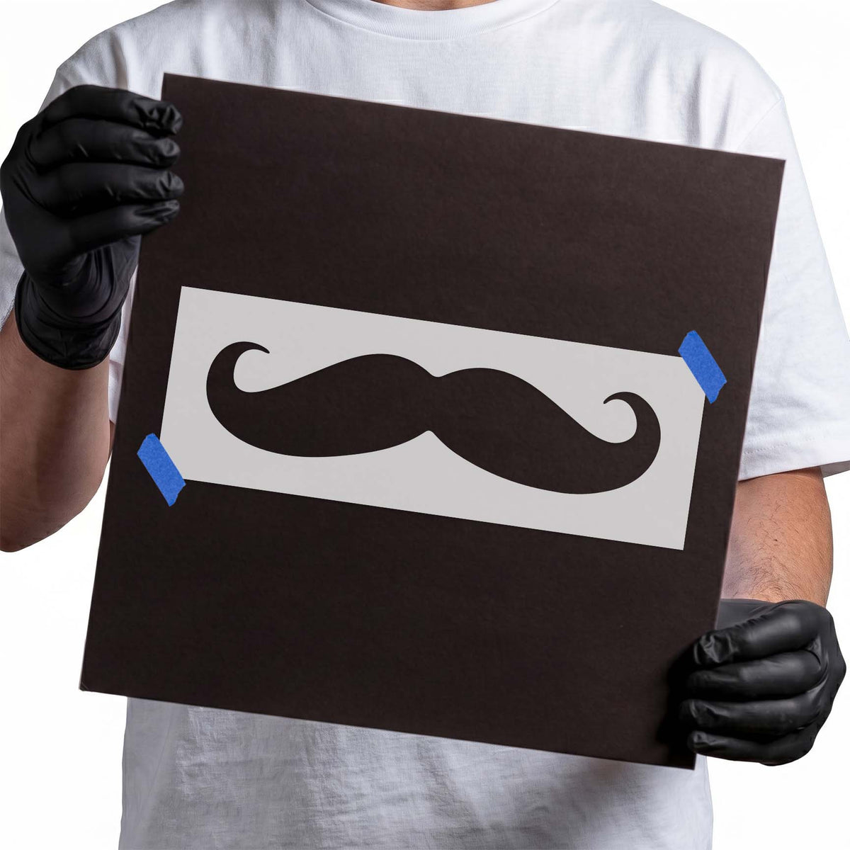 Mustache stencil featuring a thick handlebar silhouette with curled tips on both ends