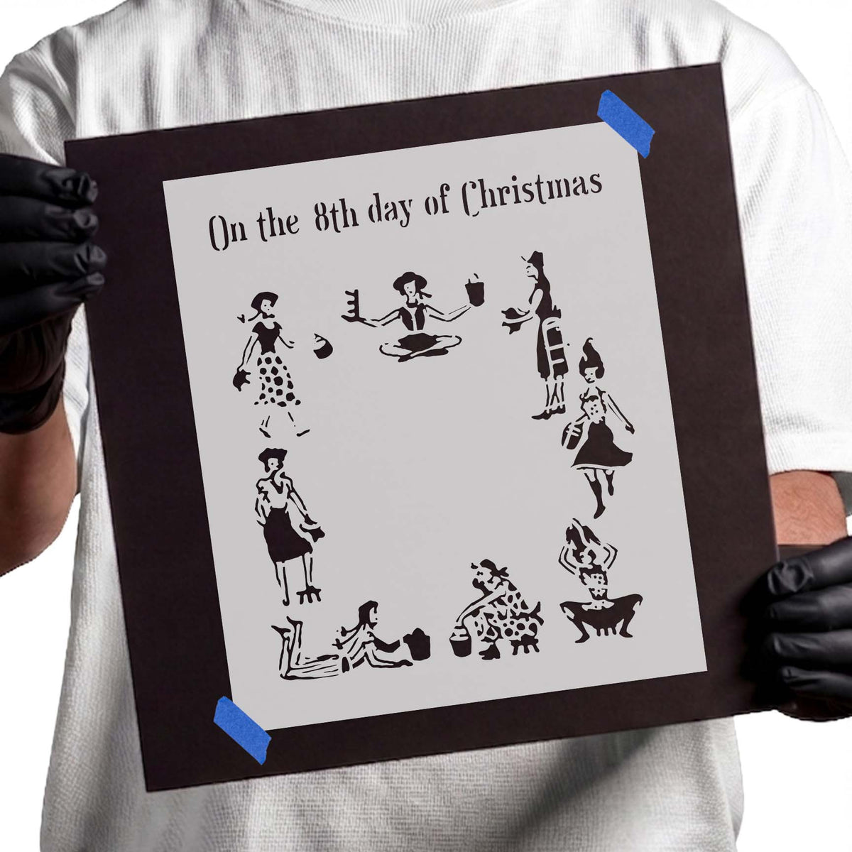Christmas stencil featuring eight milkmaids in varied poses with pails