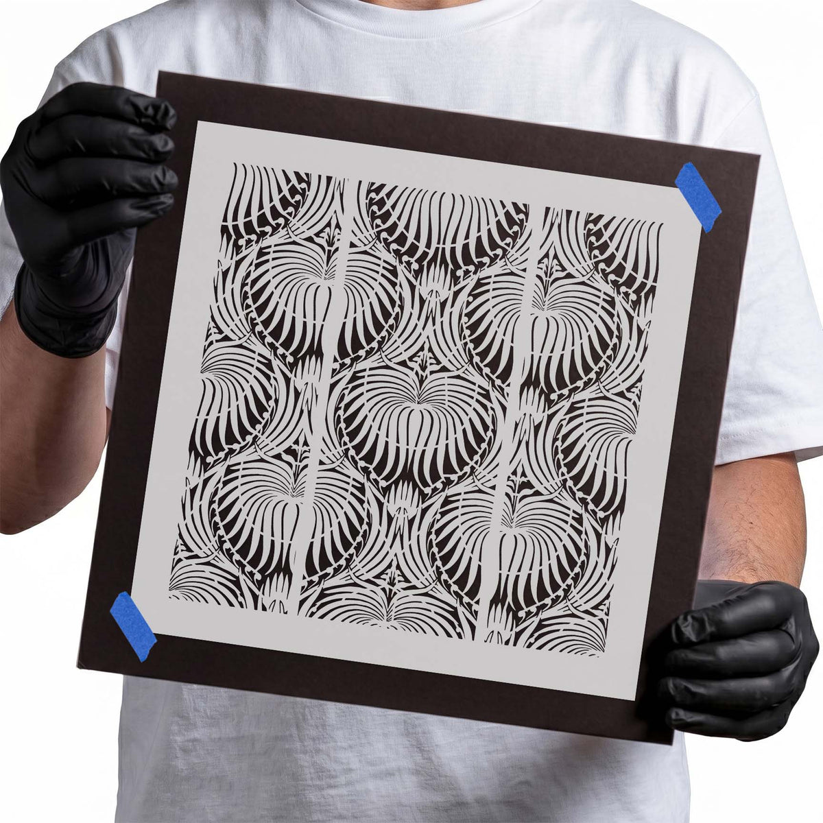 Ornate Wallpaper Pattern Stencil with repeating heart-shaped flourishes and fine curved lines