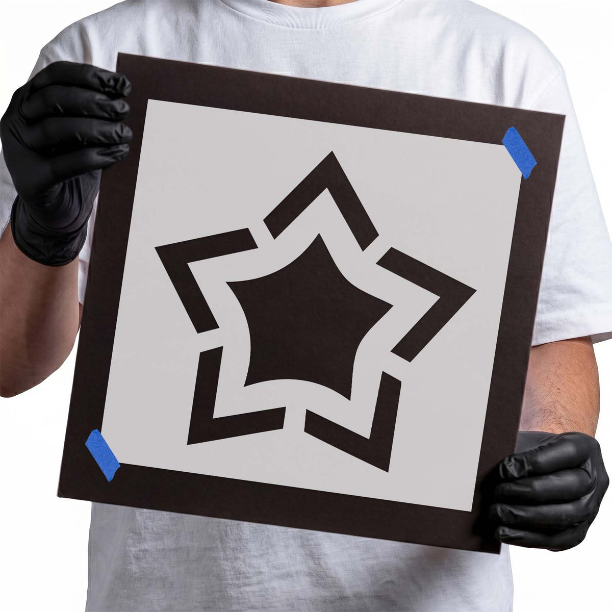 Outlined star stencil with bold five-point frame and curved inner star