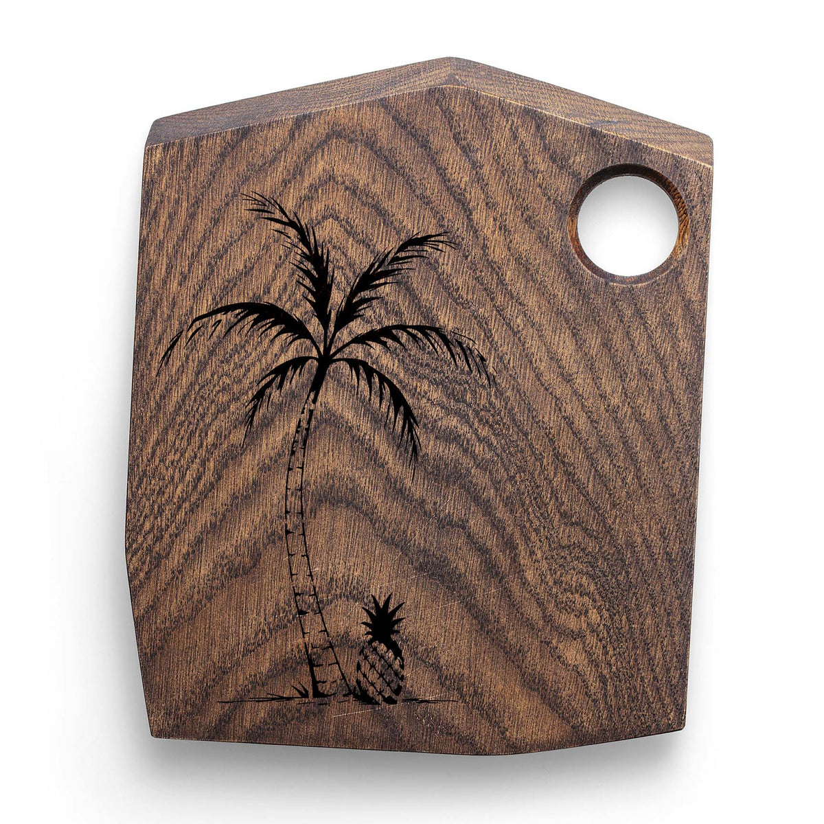 Tropical Palm & Pineapple Stencil with a slender palm and pineapple painted on a wooden cutting board
