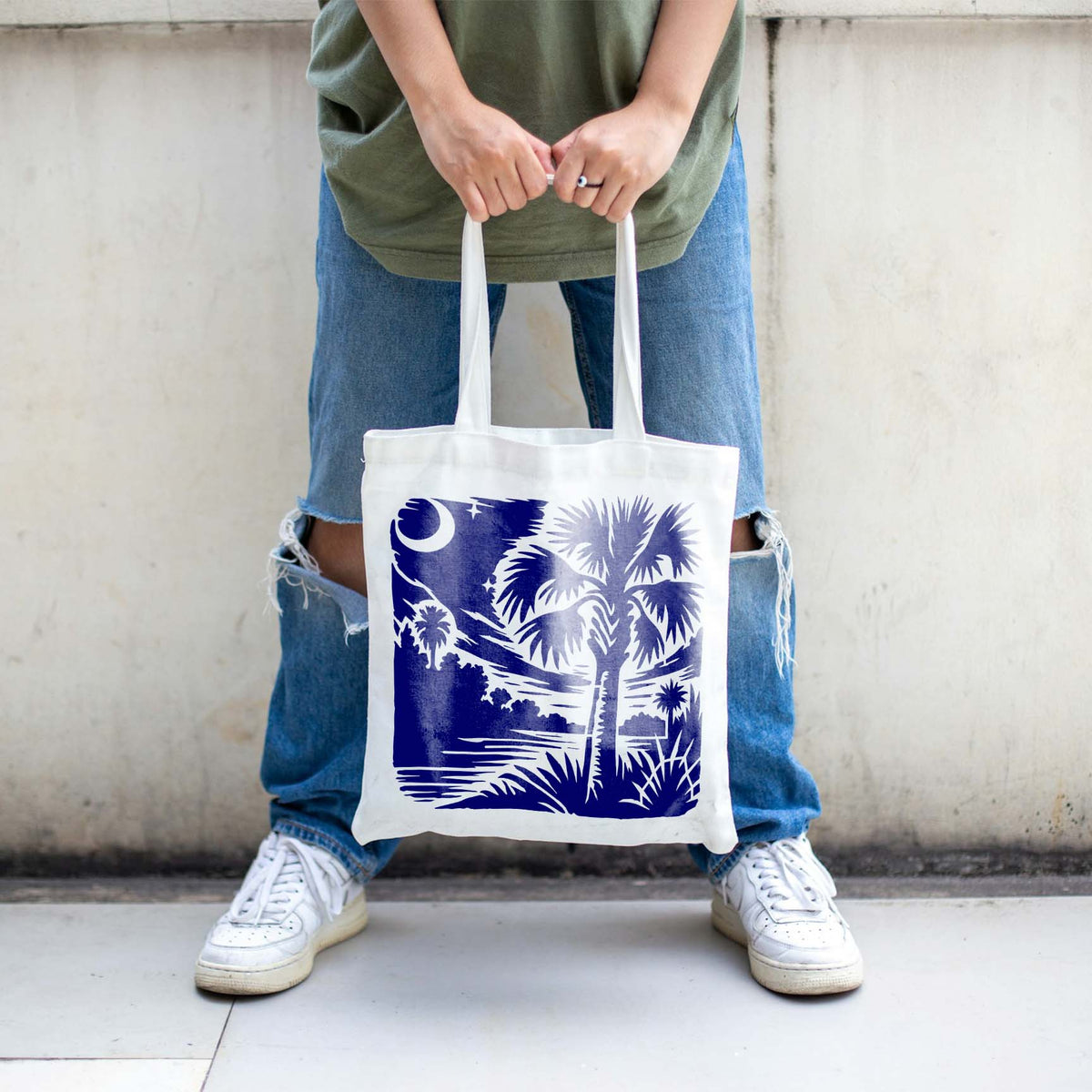 Palmetto Tree Moonlit Landscape Stencil brings a moonlit tropical scene to a white tote bag