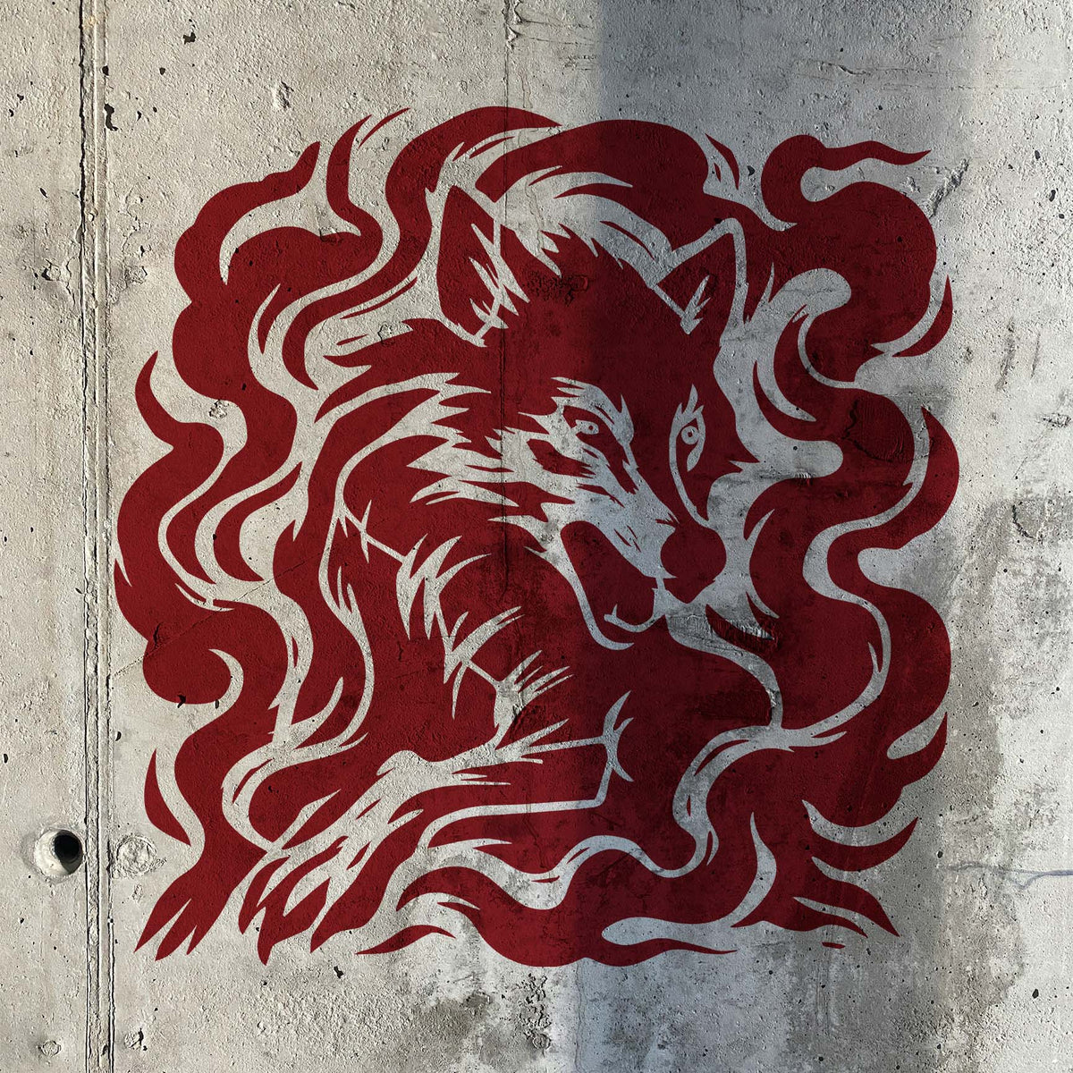 Phantom Wolf Smoke Stencil forms a red wolf emerging through swirling smoke on raw concrete.