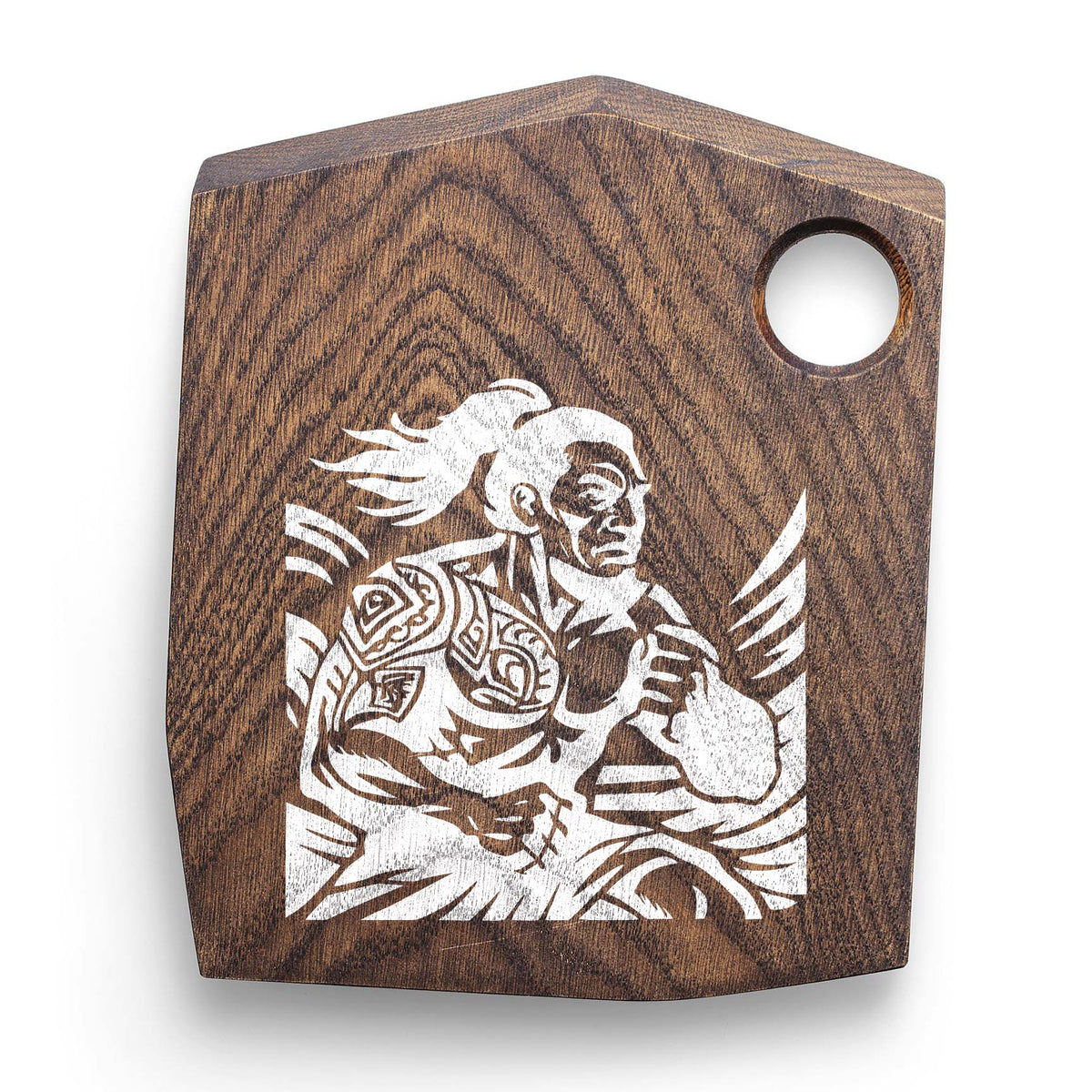 Polynesian Warrior Stencil painted white on a dark wooden cutting board.