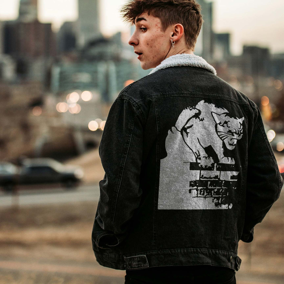 Striking Prowling Panther Stencil prowls across the back of a black denim jacket