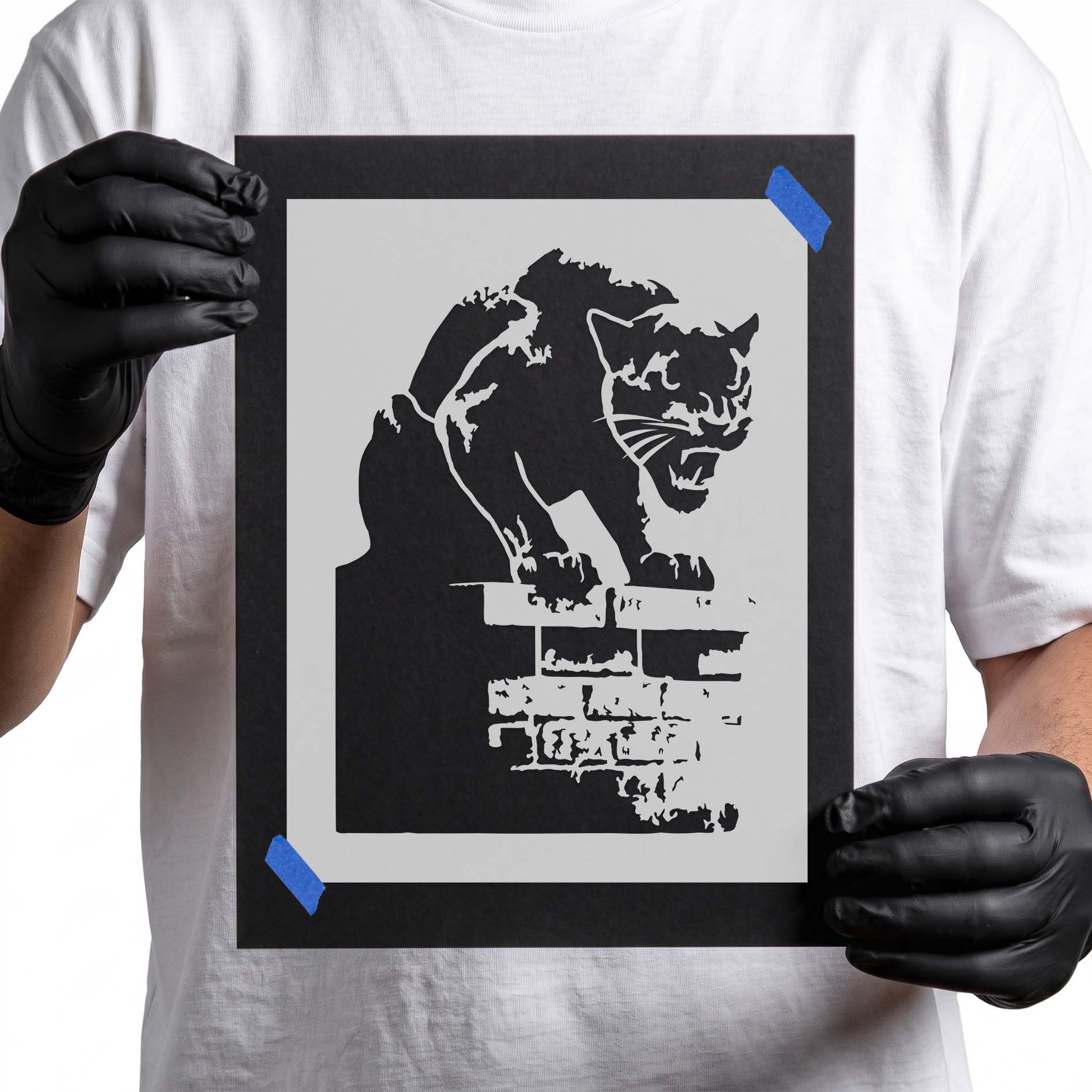 Prowling panther stencil crouched on a brick wall for wildlife painting and DIY craft projects