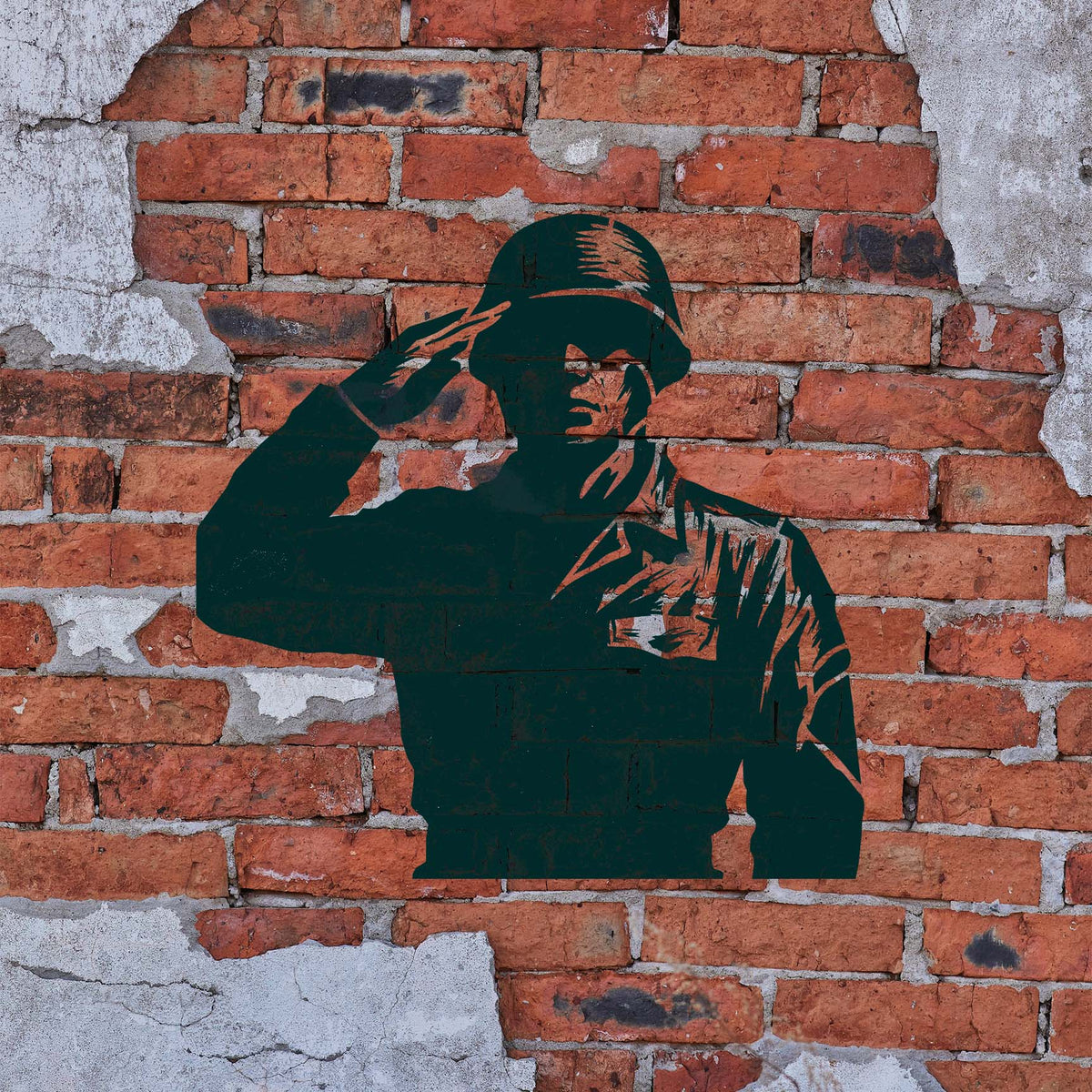 Saluting Soldier Silhouette Military Stencil painted on a weathered brick wall