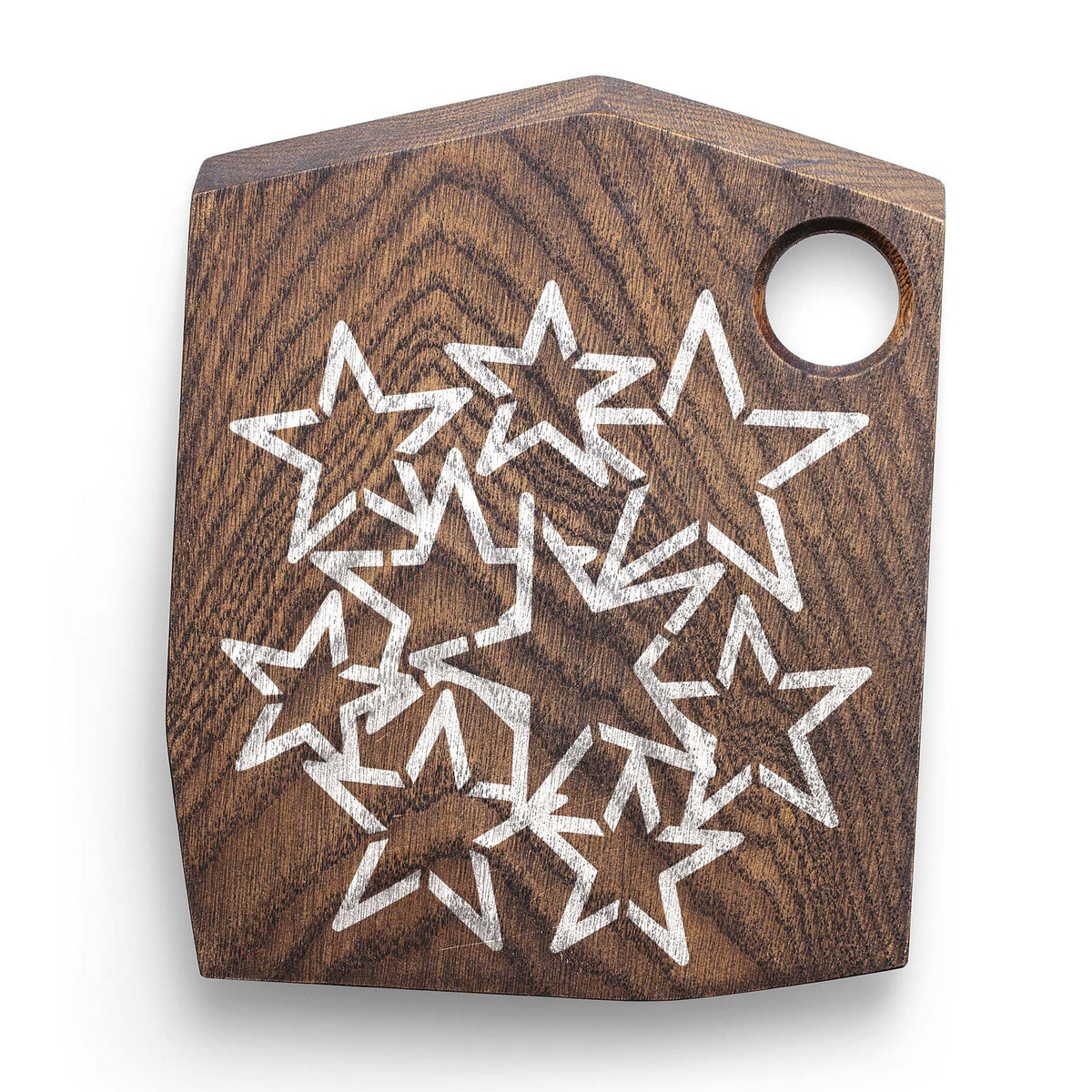 Scattered Outline Stars Stencil adds playful white star shapes to a rustic wooden cutting board.