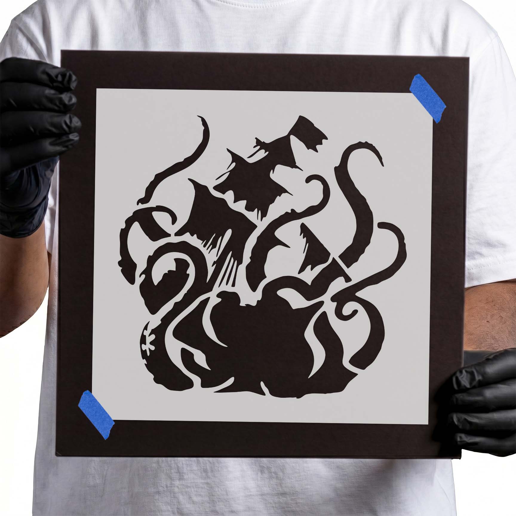 Sea monster attacking a sailing ship with massive curling tentacles