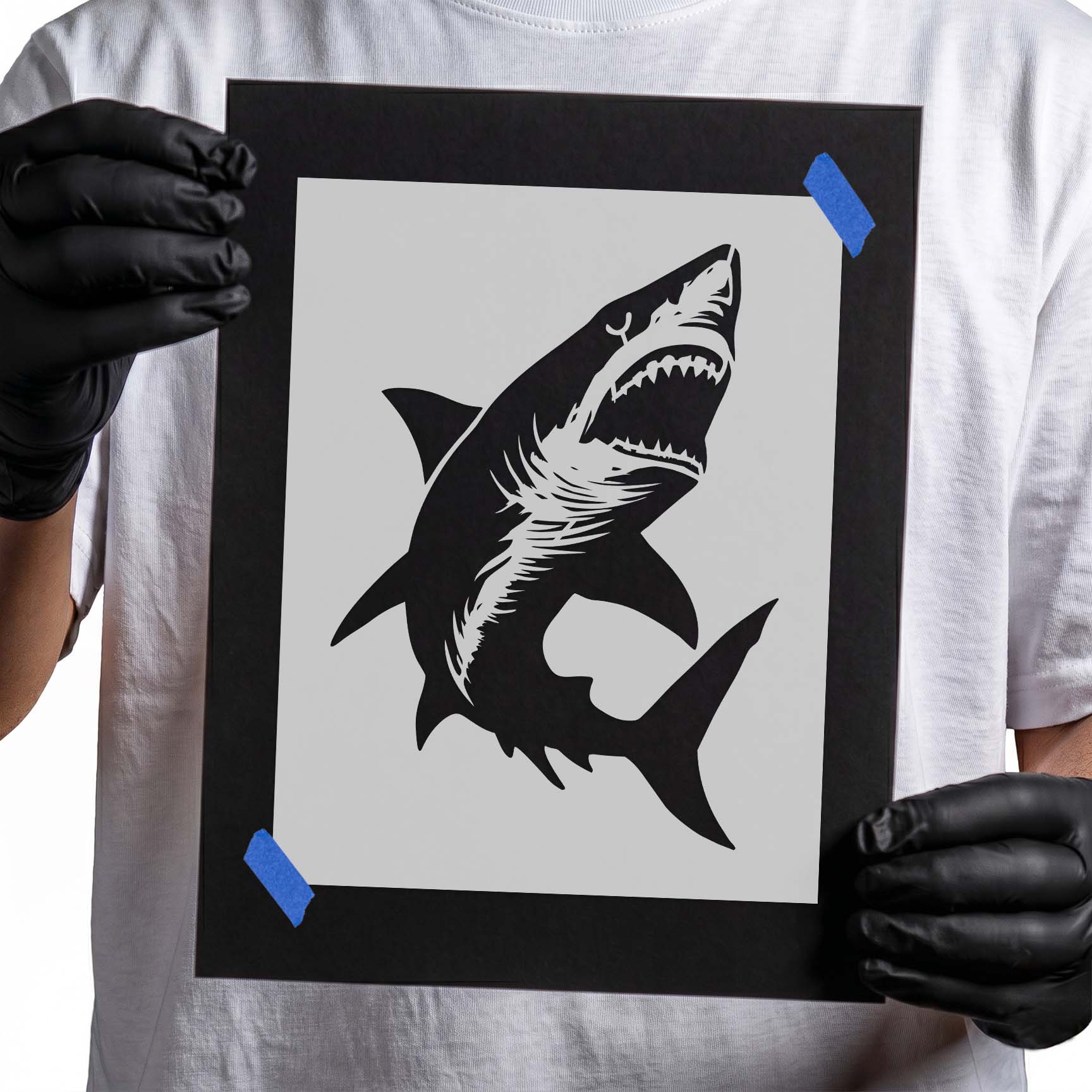Upward swimming shark stencil with open jaws