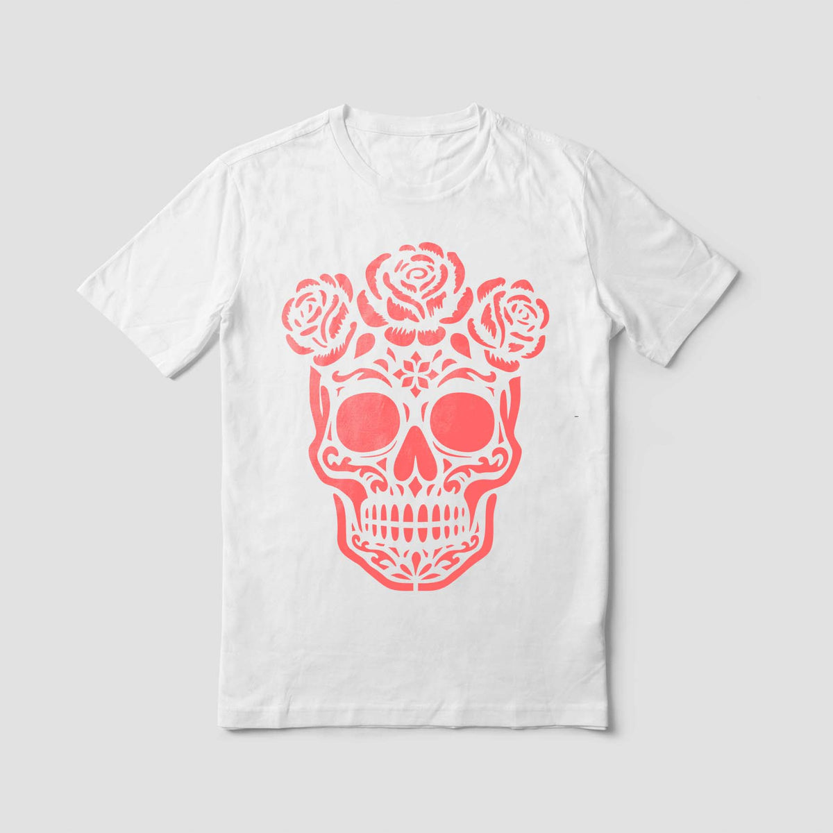 White T-shirt showcases the Skull with Roses Stencil in pink with intricate floral skull details.