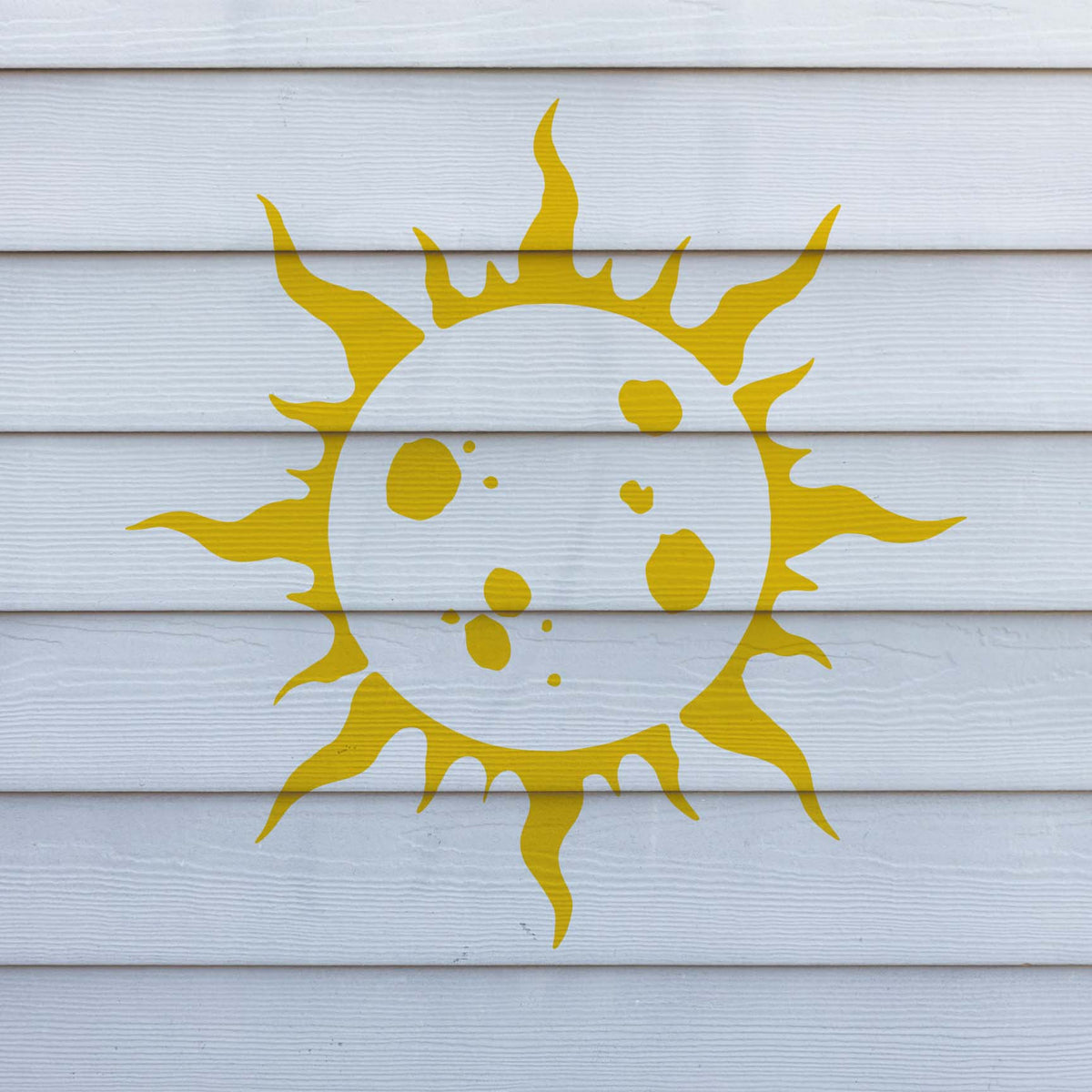 Bright yellow rays dance over white siding in this bold Solar Flare Stencil display