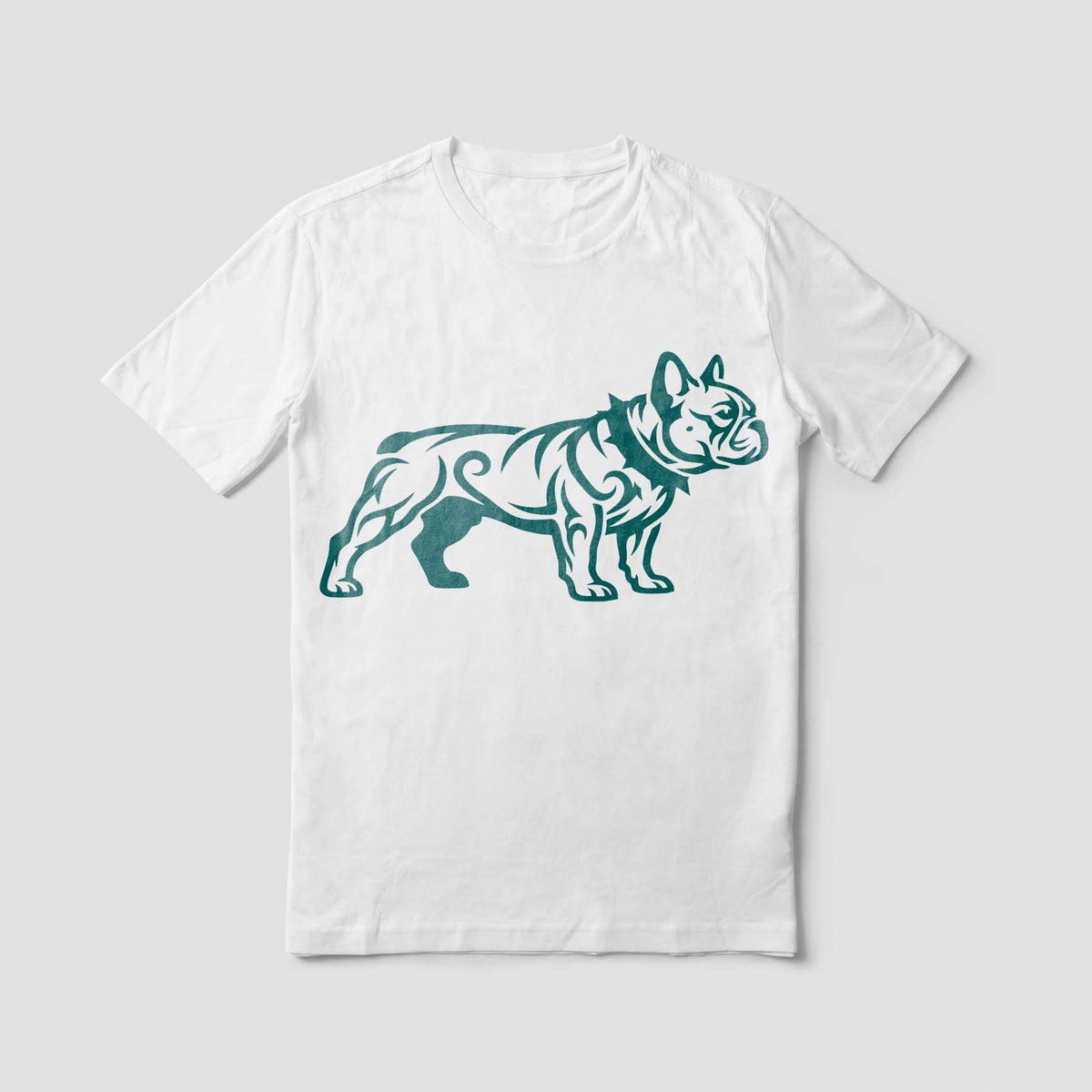 A white T-shirt displays the Standing Bulldog Stencil in teal with bold, flowing tribal details.