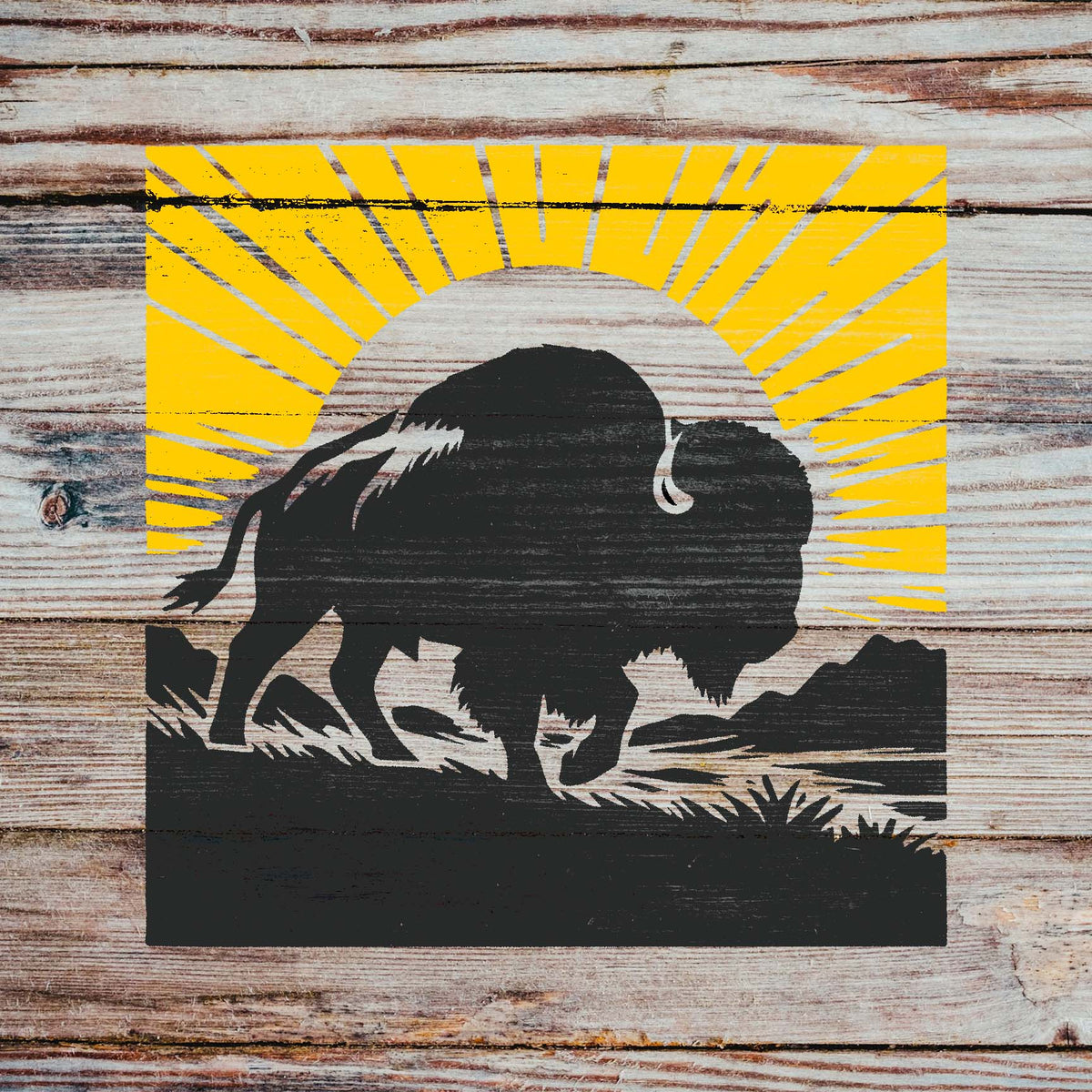 Rustic wood highlights Sunrise Buffalo Silhouette Stencil with a dark buffalo and vivid yellow sunrise