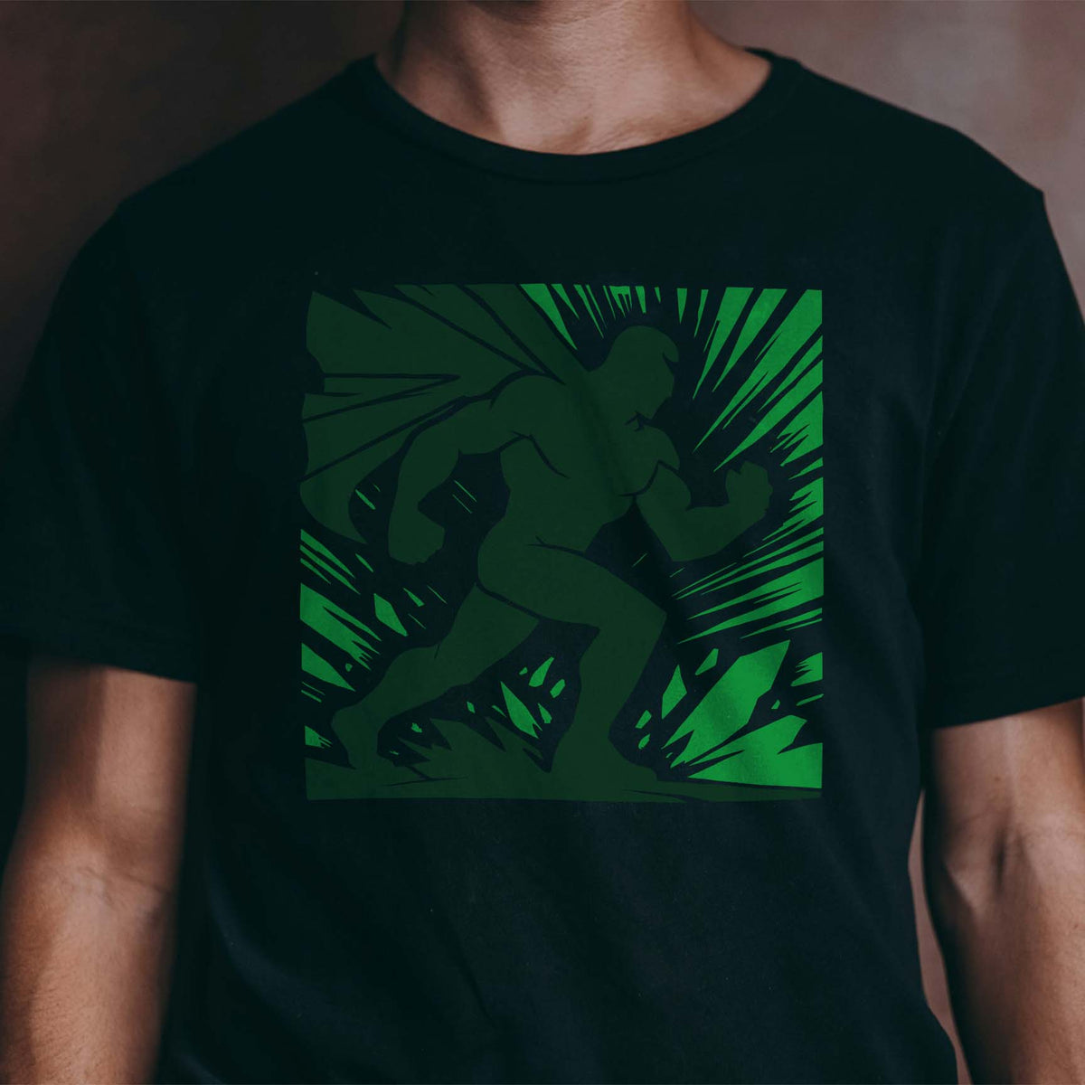 Dynamic Superhero Silhouette Stencil races across a black shirt in a bold green comic design