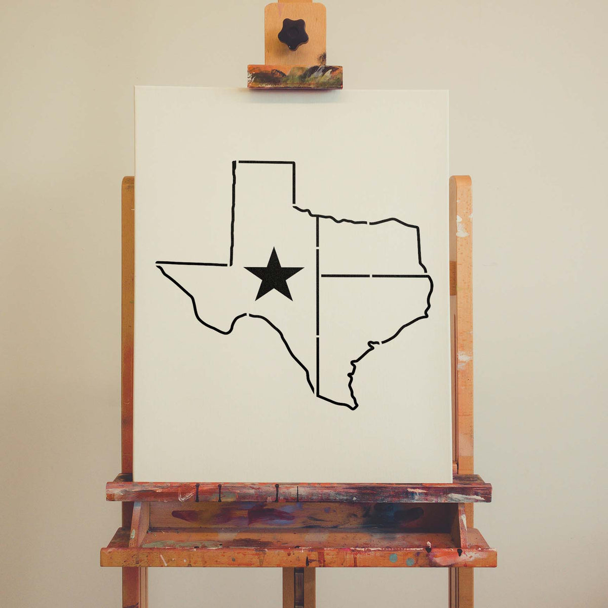 Texas Lone Star State Outline Stencil maps the state with a bold star in black on a white canvas