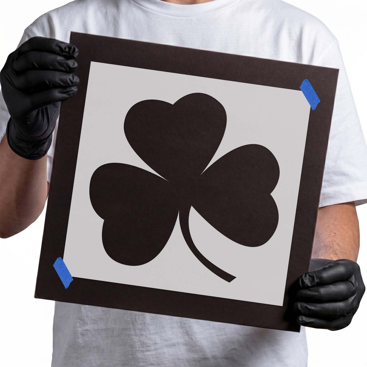Three leaf clover stencil with heart-shaped leaves and curved stem