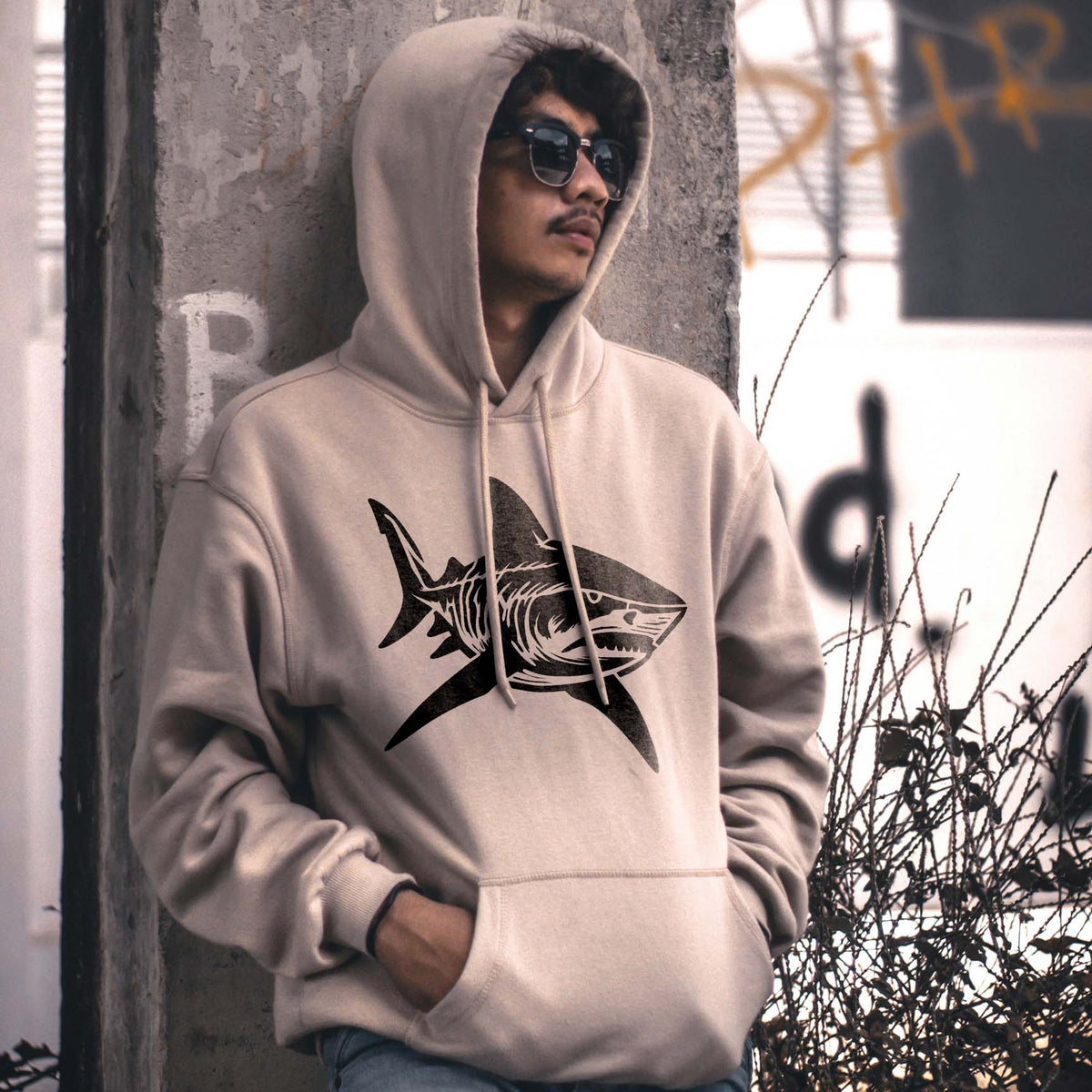 Tiger Shark Stencil displays a detailed swimming shark across the front of a beige hoodie