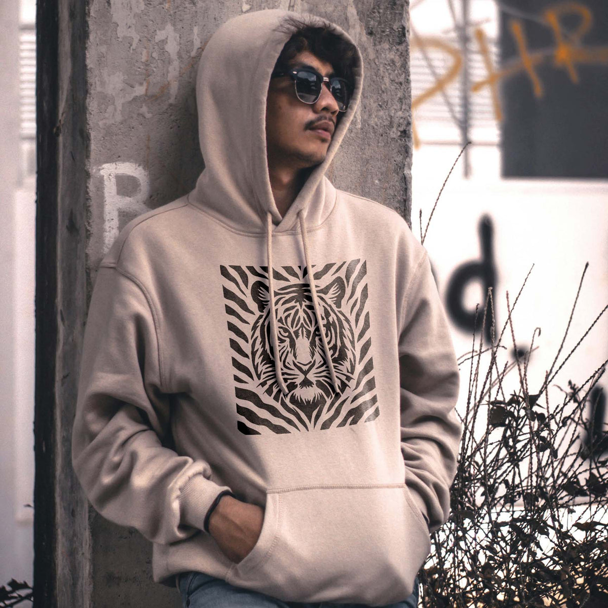 Beige hoodie showcases the Tiger Stripe Pattern with Tiger Face Stencil in striking black