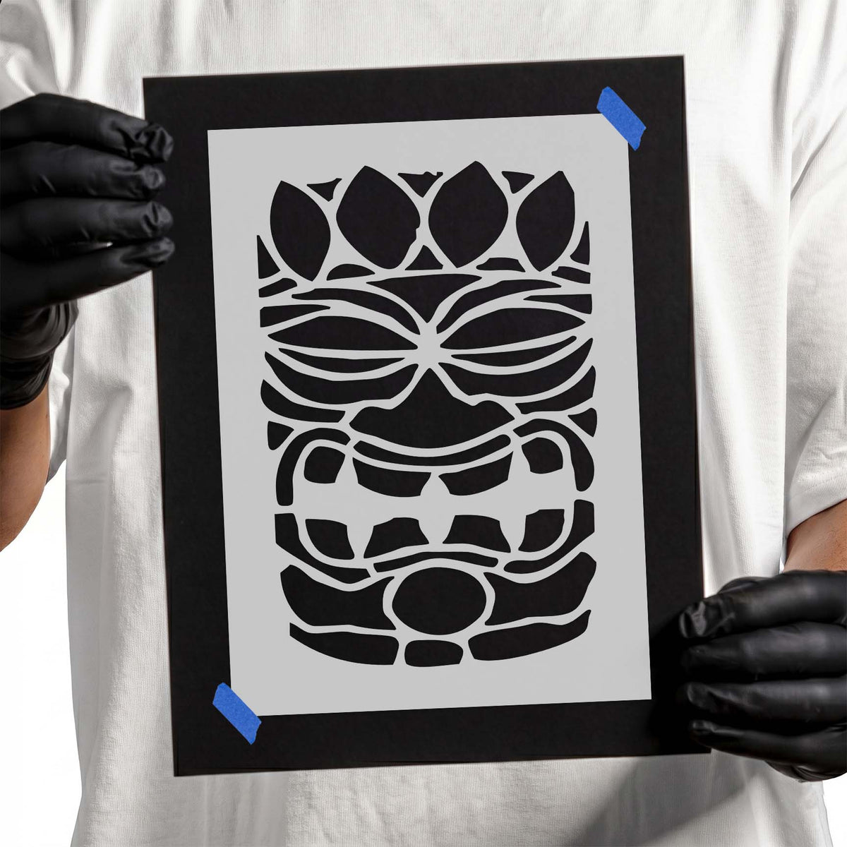 Simple tiki face stencil with narrow eyes and bold geometric details