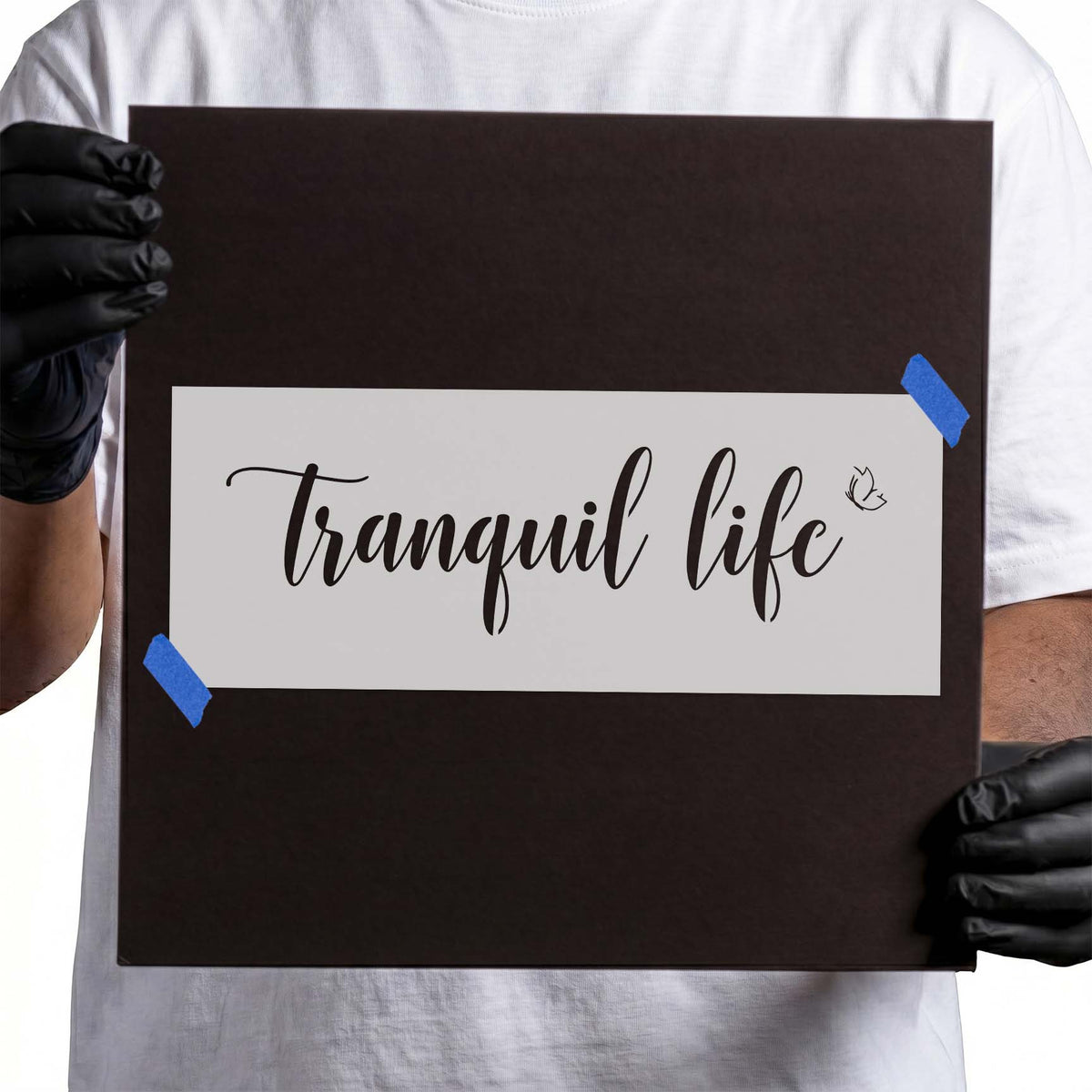 Tranquil life script lettering with a small butterfly accent stencil