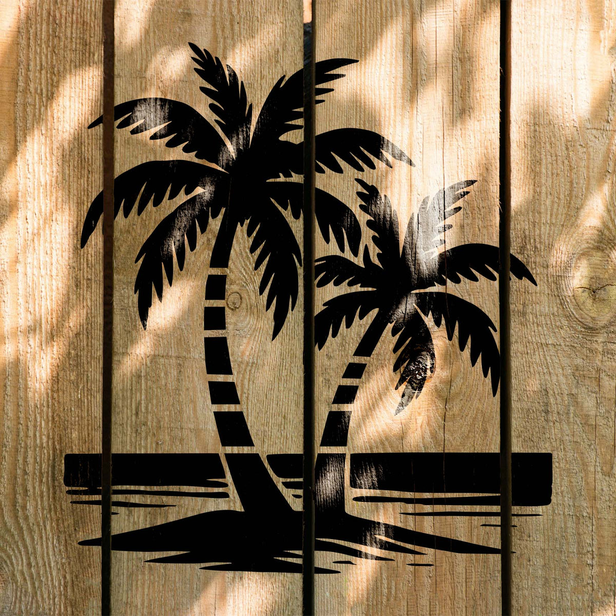 Bold twin palm beach stencil stretching across sunlit rustic wood planks