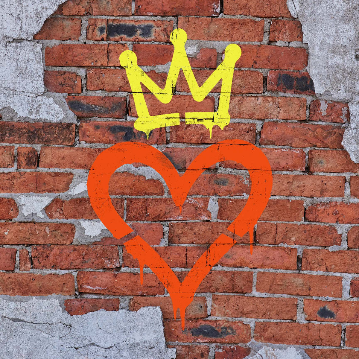 Urban Crown Heart Stencil brings a dripping orange heart and yellow crown to a weathered brick wall
