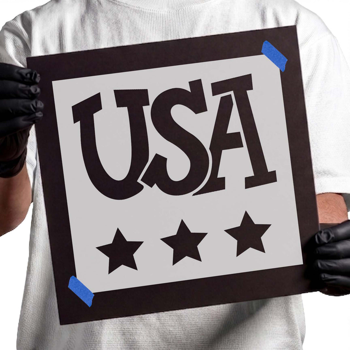 USA patriotic stencil featuring bold decorative block lettering and three five-pointed stars