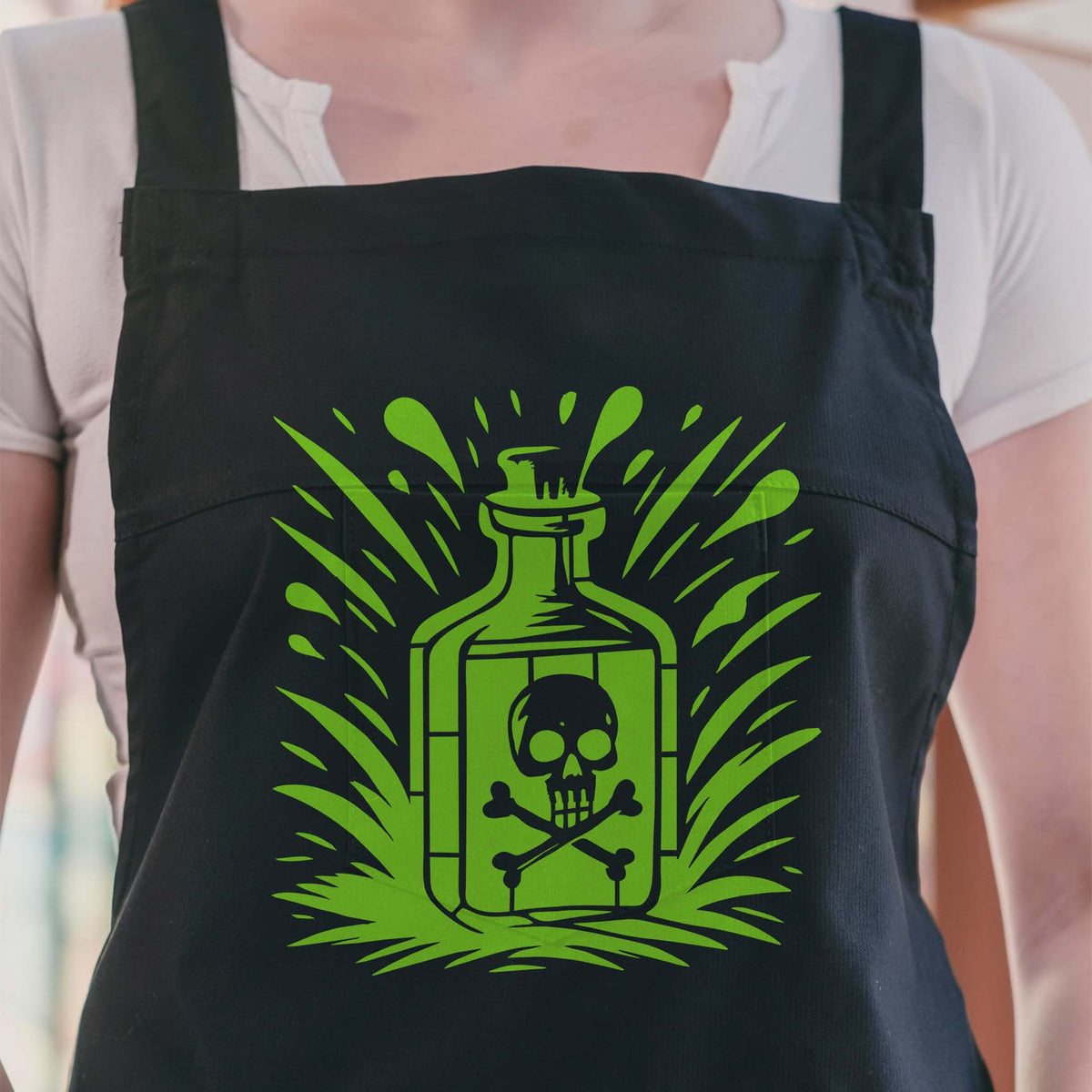 Vintage Poison Bottle Skull & Crossbones Stencil in vivid green on a black apron
