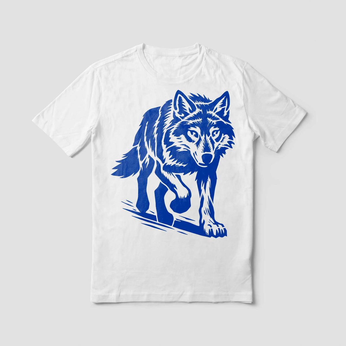 Walking Wolf Stencil painted in blue across a white T-shirt with detailed fur and forward stride.