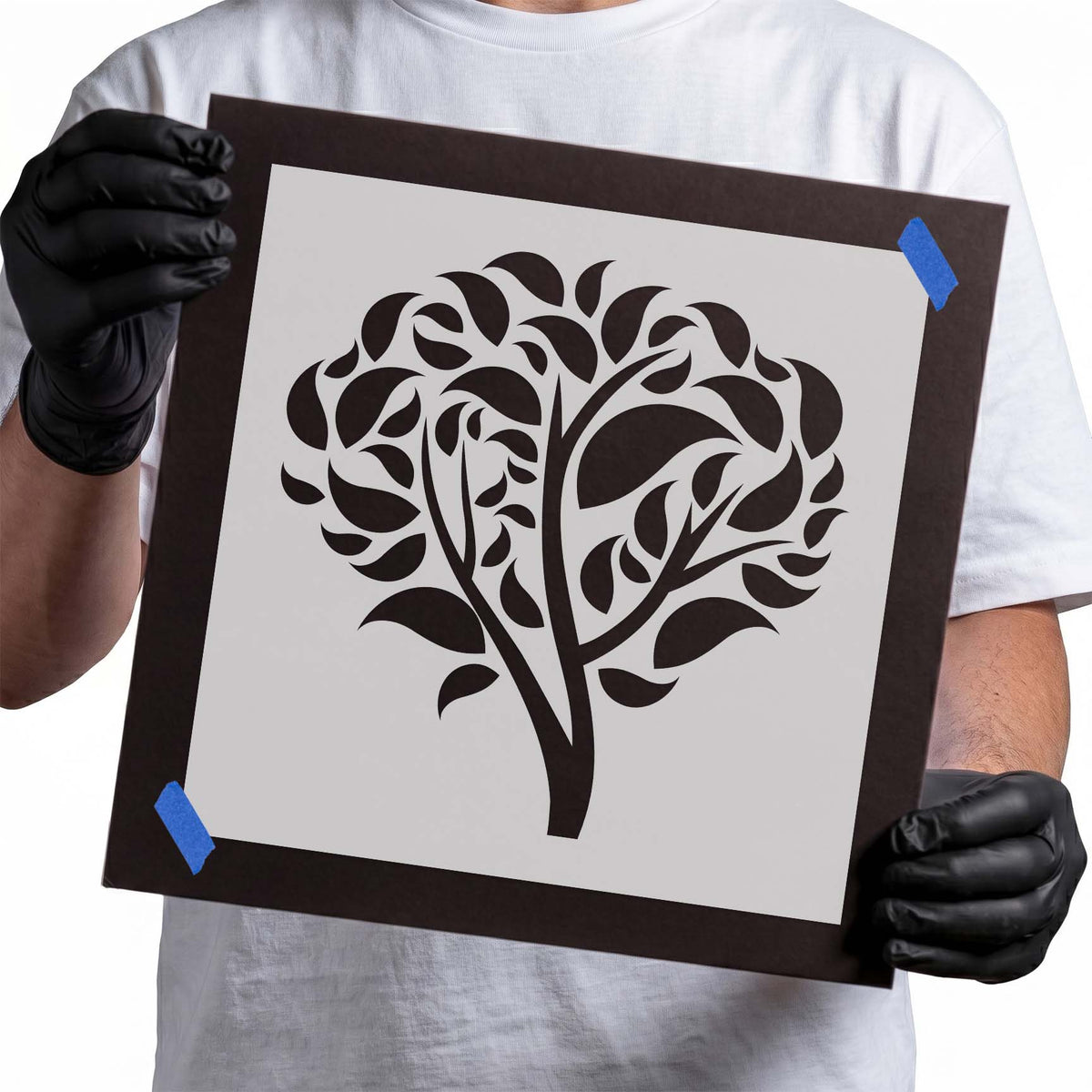 Tree stencil with flowing branches and layered curved leaves