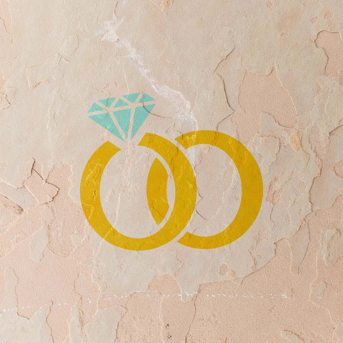 Interlocking Wedding Rings stencil with golden bands and aqua diamond on textured wall