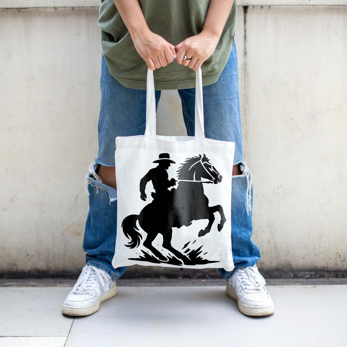Western Cowboy on Rearing Horse Stencil printed on a white tote bag.