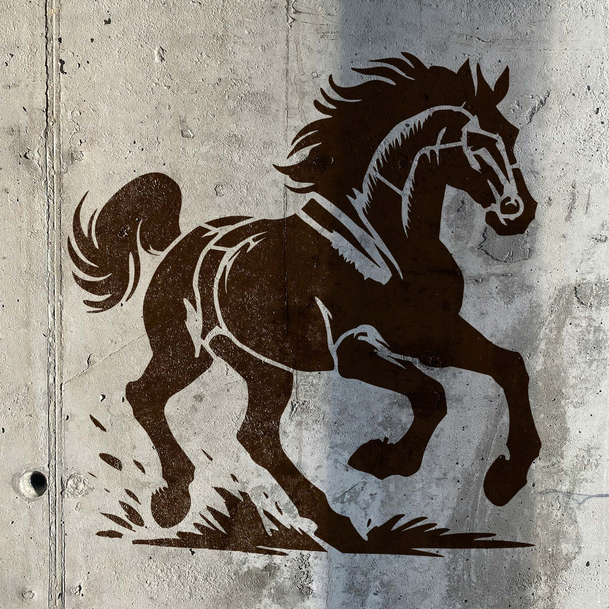 Painted on concrete, the Wild Mustang Stencil shows a horse charging forward