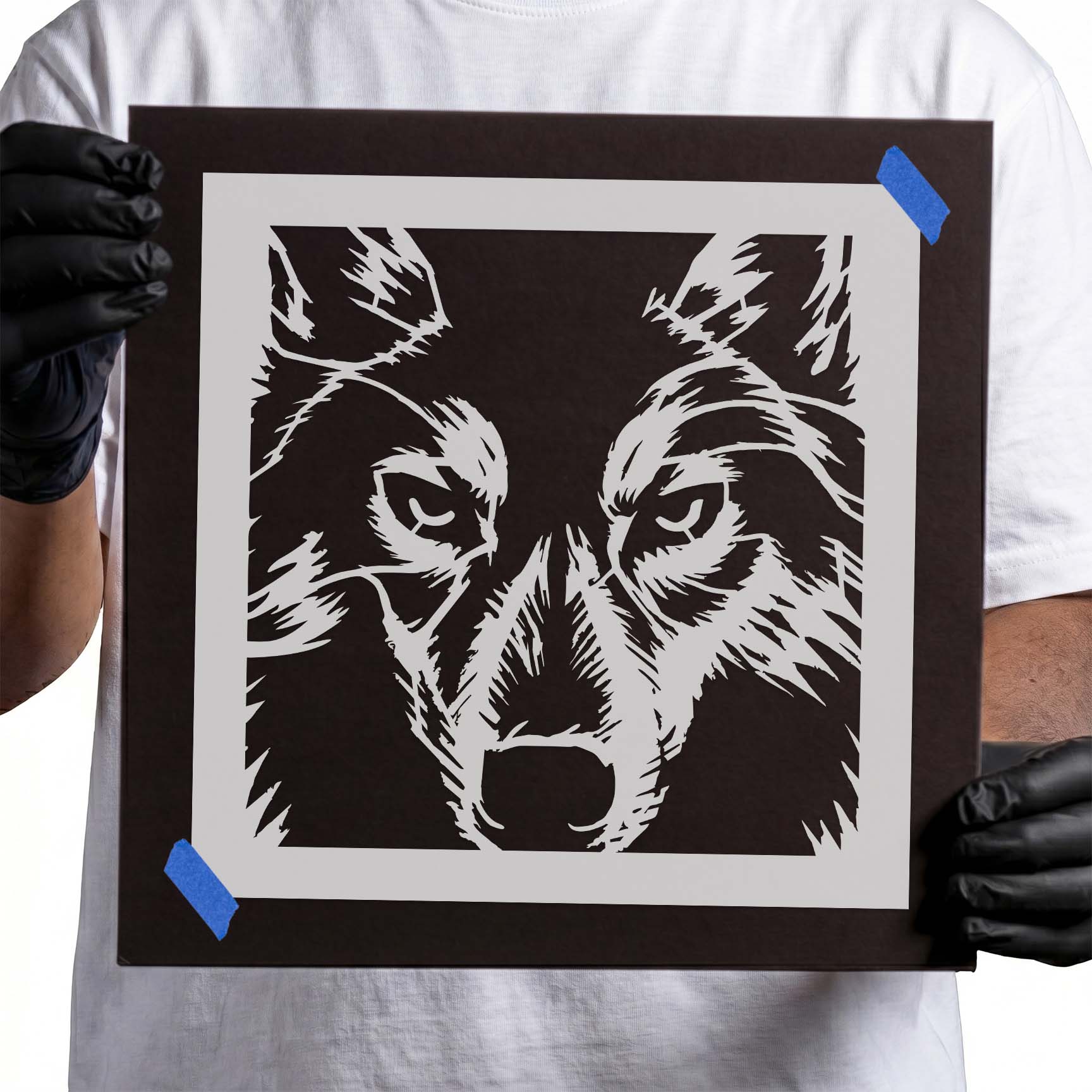 Close-up wolf face stencil featuring detailed piercing eyes