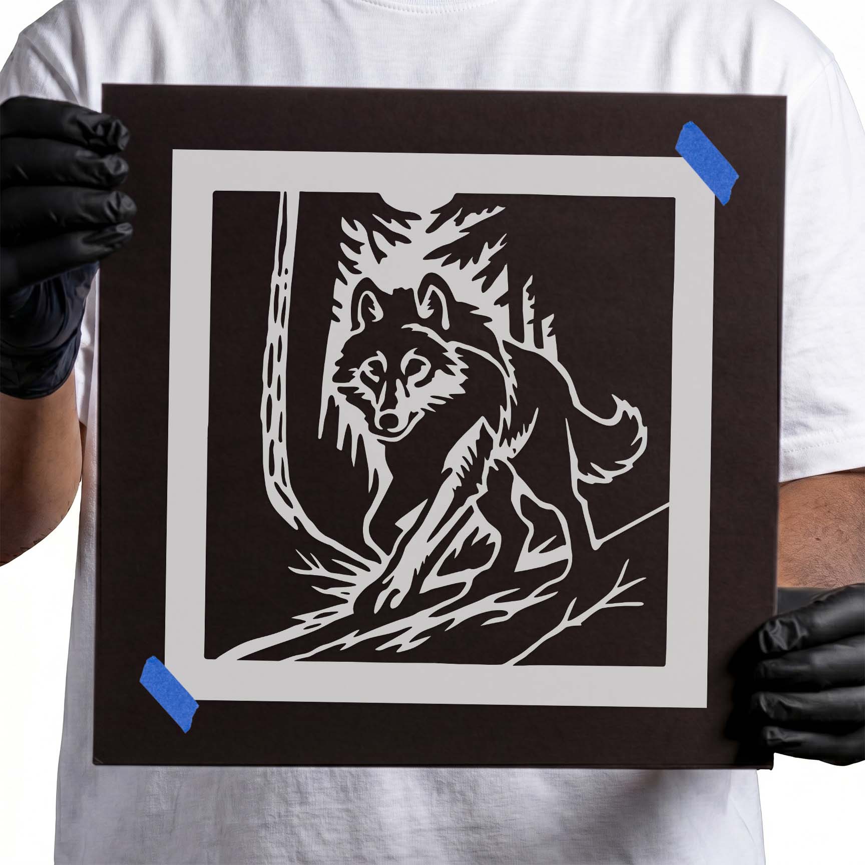 Woodland Wolf Forest Scene Stencil featuring a wolf walking through tall trees.