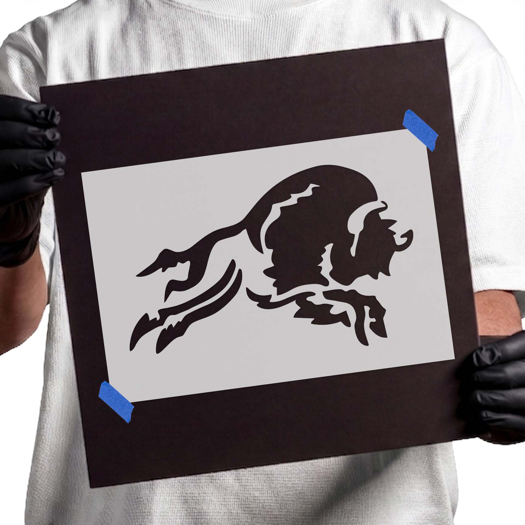 Charging buffalo stencil with lowered horns and extended legs