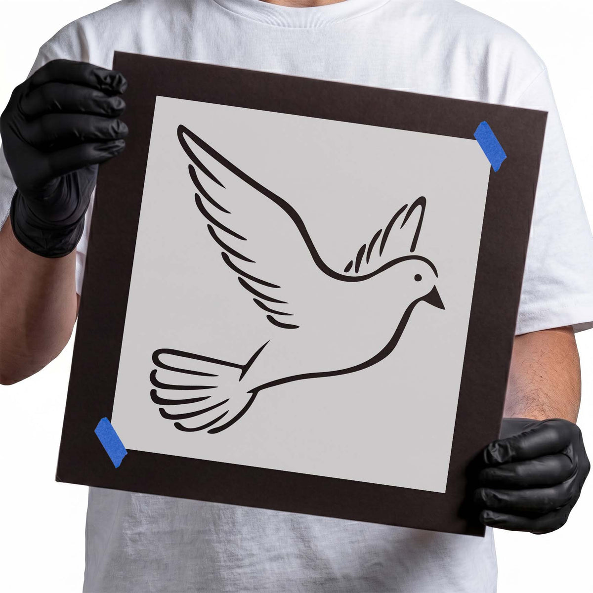 Dove stencil with raised wings, fanned tail, and feather details