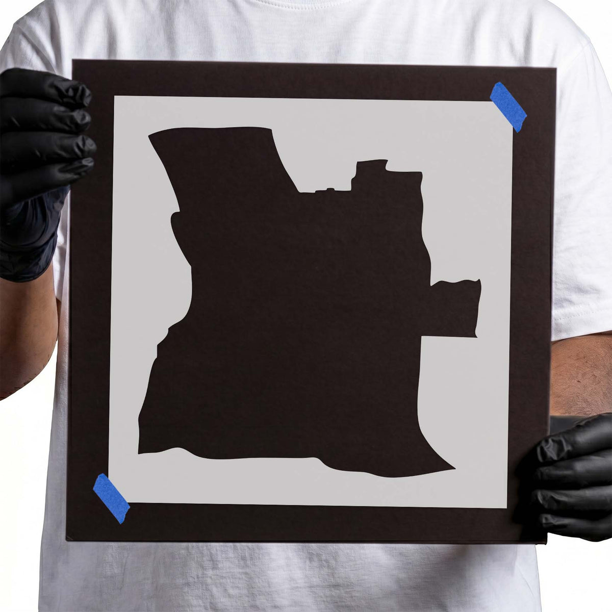 Angola stencil displaying a bold solid geographic country silhouette