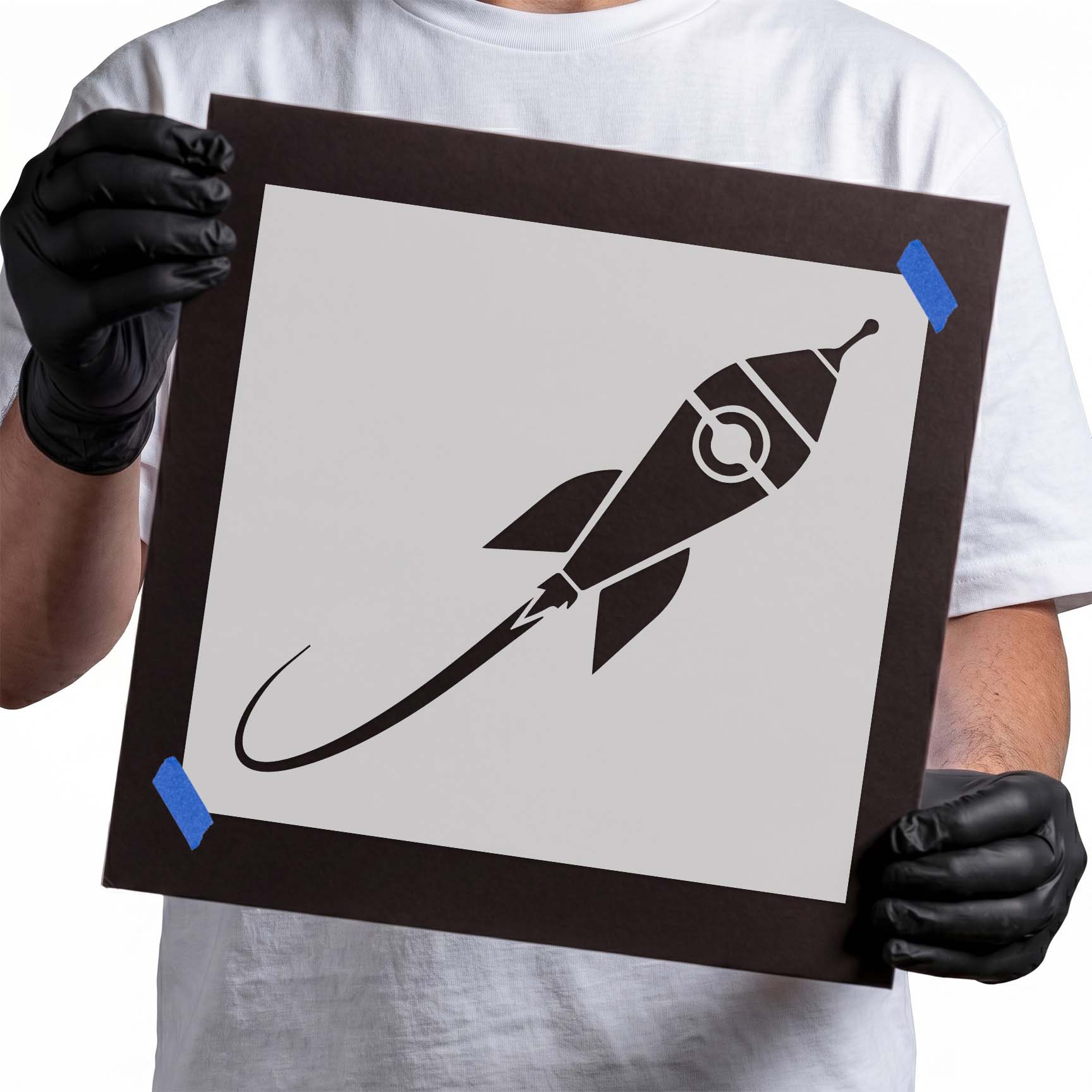 Rocket ship stencil with fins and sweeping exhaust trail