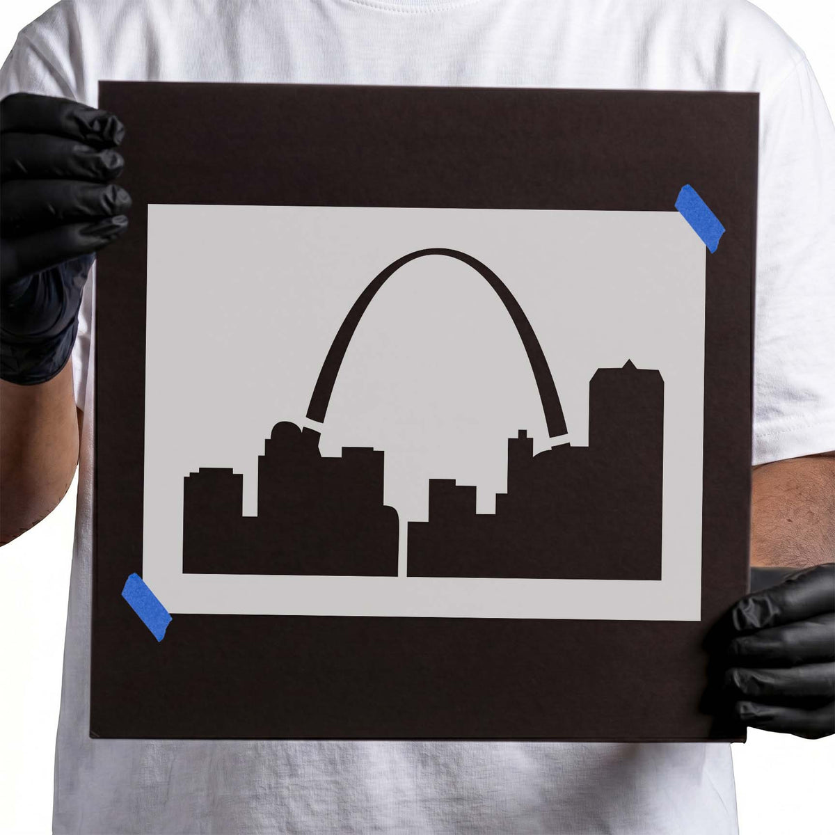St Louis Arch stencil rising above a solid city skyline