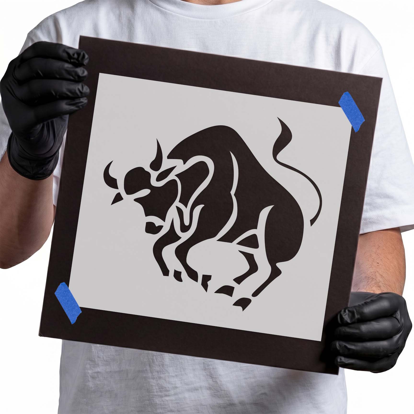 Taurus zodiac bull stencil with prominent horns and raised tail